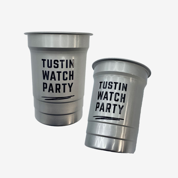 2 Grey Aluminum looking plastic cups with 'TUSTIN WATCH PARTY' printed on them