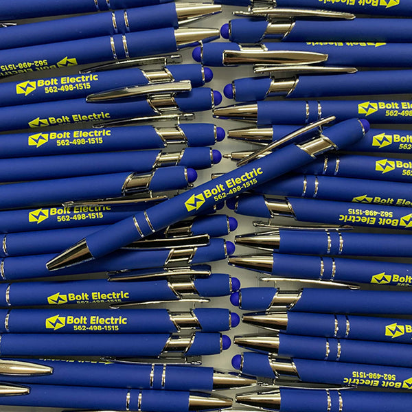 Stack of blue pens with 'Bolt Electric' branding.