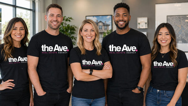 A.i. generated image of Five people wearing black t-shirts with 'the Ave' logo in an office setting.