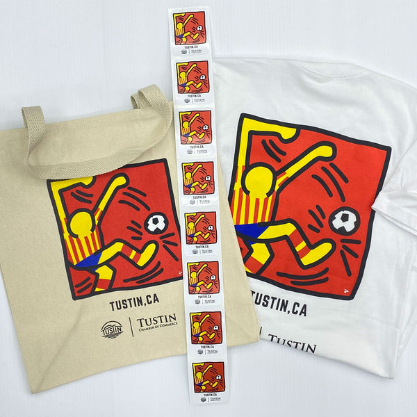 A canvas tote bag, a white T-shirt, and a vertical strip of stickers, all featuring a colorful graphic print of a stylized soccer player in red, yellow, and blue on a white background. The tote bag also has 'TUSTIN.