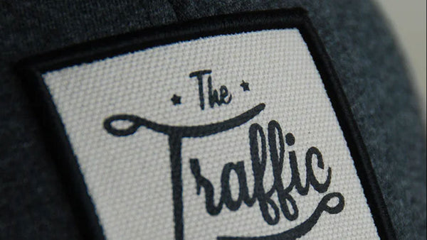 Screen printed label on a product with 'The Traffic Supply Co' branding.